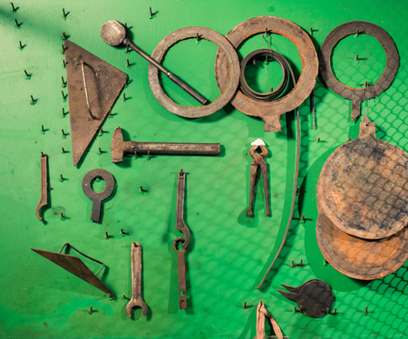 old rusty metallic instruments and toolsの写真素材