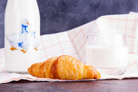 Bottle milk, glass and croissantの写真素材