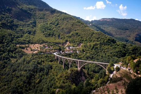 1940s concrete bridge with large arches and a picturesque view in Montenegroの写真素材