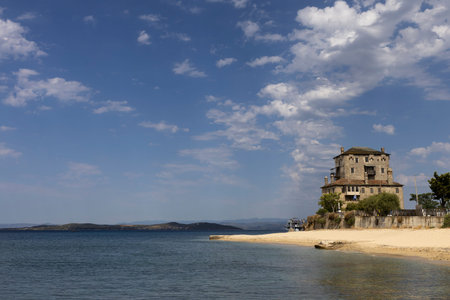 Byzantine Coastal Tower Overlooking the Aegean Sea in Ouranoupolis, Greeceの写真素材