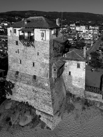 Byzantine Coastal Tower Overlooking the Aegean Sea in Ouranoupolis, Greeceの写真素材