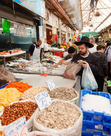 Jerusalem, Israel - November 15, 2012 - people are shopping at Mahane Yehuda - famous market in Jerusalemのeditorial素材