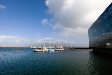 REYKJAVIK, ICELAND - AUGUST 31, 2013  Marina outside of Harpa concert hall in Rejkjavik, Iceland  Harpa was opened on May 13, 2011  It was selected as Best Performance Venue 2011 by Travel   Leisure magazineのeditorial素材
