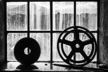 Old gears in an abandoned metal shop in Iceland