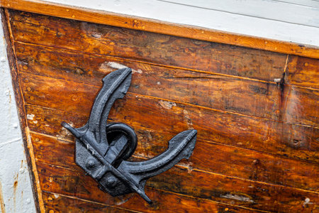 Closeup image of an anchor of a large sailing boatの写真素材