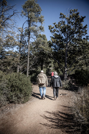 Senior couple is hiking on a trail in Tonto Bridge State Park in Arizona