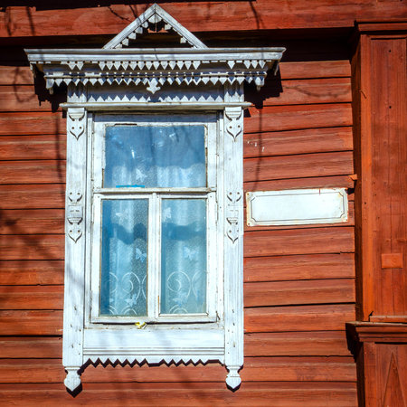 Fragment of traditional old house facade in Kostroma, Russiaの写真素材