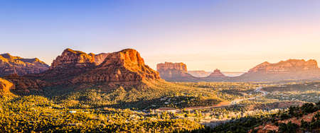 Scenic view to Courthouse Butte, Bell Rock and surrounding red rocks formations in Sedona, Arizona at sunsetの写真素材