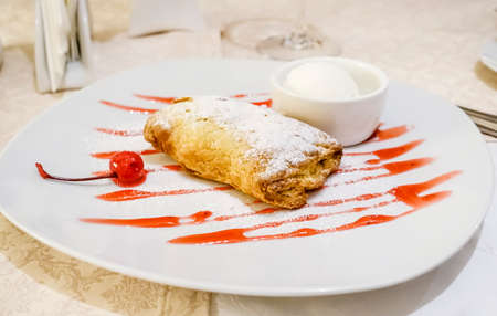 Dessert plate with cherry cobblerの写真素材