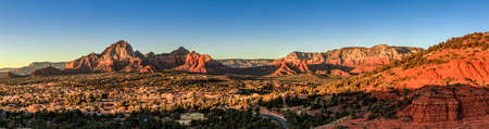 Birds eye panorama of the city of Sedona, Arizona and the Red Rocks at sunsetの写真素材