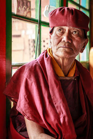Ladakh, India - July 10, 2016: Portrait of a Buddhist monk in traditional robe at a monastery in Ladakh, Kashmir, Indiaのeditorial素材