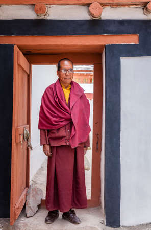 Ladakh, India - July 10, 2016: Portrait of a Buddhist monk in traditional robe at a monastery in Ladakh, Kashmir, Indiaのeditorial素材
