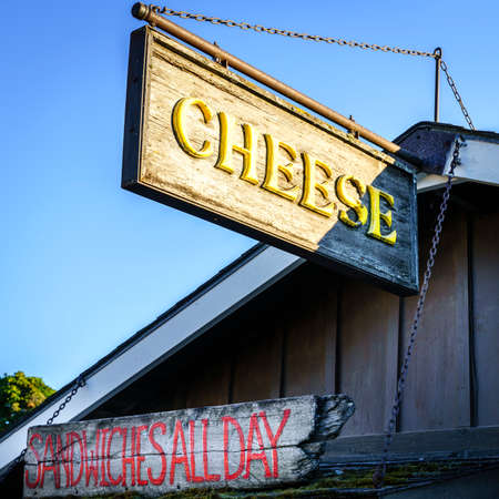 Cheese shop sign in fishtown, Leland, Michiganのeditorial素材