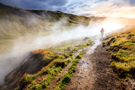 Hiking along Hot River in Reykjadalur Valley in South Icelandの写真素材