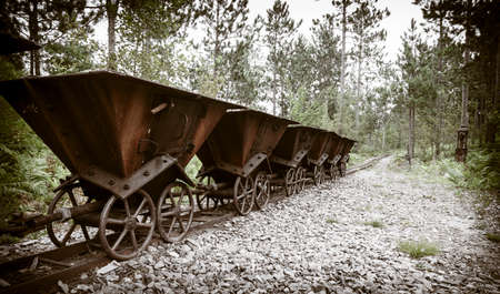Old ore carts at an abandoned mine on Upper Peninsula, Michiganの写真素材