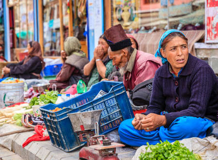 Leh, Ladakh, India, July 12, 2016: produce vendors on a sidewalk market in Leh, Ladakh district of Kashmir, Indiaのeditorial素材