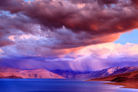 Storm at sunset over lake Tso Moriri in the Himalayas, Kashmir, Indiaの写真素材
