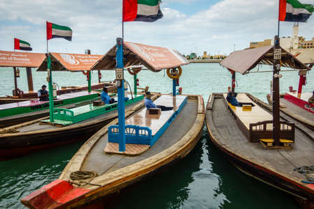 Dubai, UAE, january 29, 2016: Traditional abras are awaiting passengers on Dubai Creek, Bur Dubai.のeditorial素材