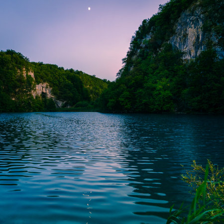 Moon over lower lakes in Plitvice Lakes National Park, Croatiaの写真素材