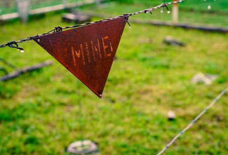 Old mine field sign as a leftover from the siege in Sarajevo, Bosniaの写真素材