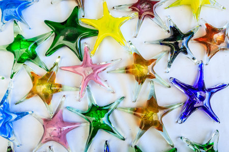 Colorful glass seastars at a souvenir shop in British Virgin Islandsの写真素材