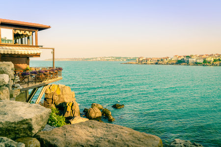 Restaurant overlooking Black Sea coastline of Sozopol, Bulgaria
