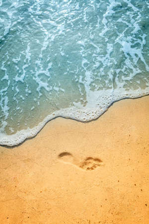 Footprint in the sand on a beach in British Viirgin Islandsの写真素材