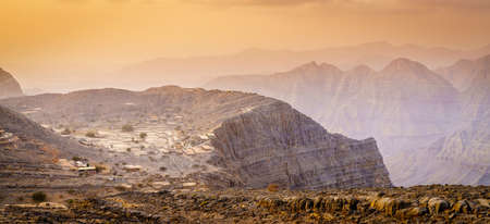 Scenic view of Hajar Mountains of Ras Al Khaimah, UAE at sunsetの写真素材