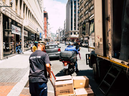 Cape Town, South Africa, February 9, 2018: Unloading delivery truck in downtown Cape Town, South Africaのeditorial素材