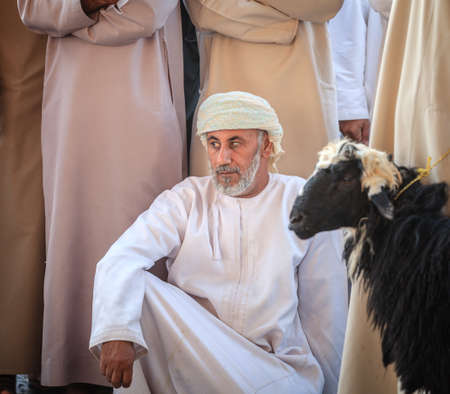 Nizwa, Oman, December 2, 2016: Shoppers at the Friday goat market in Nizwa, Omanのeditorial素材