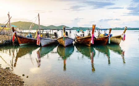 Traditional Thai long tail boats at a fishing village on Ko Yao Yai islandの写真素材