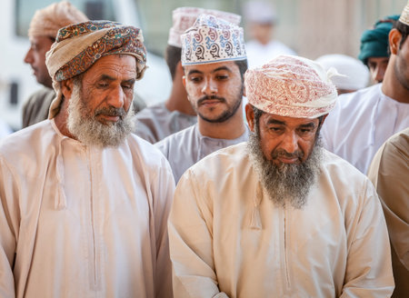 Nizwa, Oman, December 2, 2016: Local men shopping at the Friday goat market in Nizwa, Omanのeditorial素材