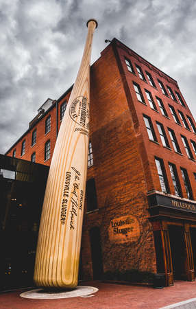 Louisville, KY, February 23, 2020: Oversized baseball bat sculpture in front of Louisville Slugger museum and factory in downtown Louisville, Kentuckyのeditorial素材