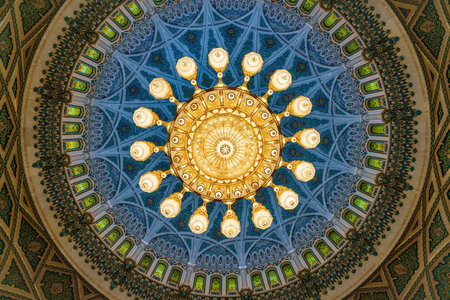 Muscat, Oman, December 3, 2016: The chandelier in the main prayer hall of the Sultan Qaboos Grand Mosque in Muscat, Omanのeditorial素材