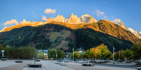 A view of Mont Blank and surrounding peaks from a town square in Chamonix, France