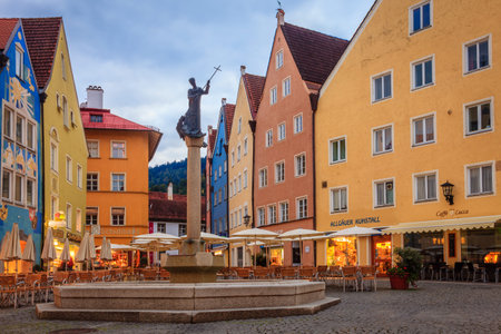 Fussen, Germany, September 27, 2015: Central square in Fussen featuring a landmark fountain - Stadtbrunnenのeditorial素材