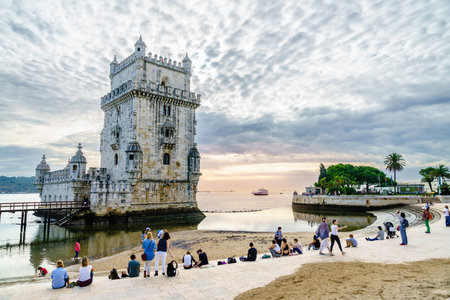 Lisbon, Portugal, October 26, 2016: People are enjoying beautiful evening in Torre de Belem Park in Lisbon, Portugalのeditorial素材