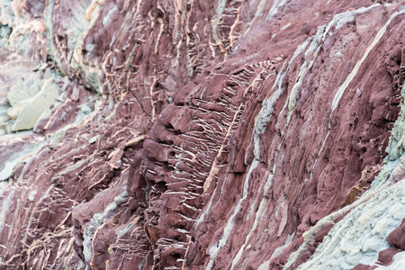 Colourful rocks in east Greenland close up. Rock texture.