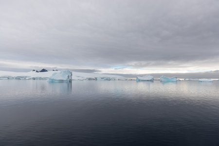 Antarctic landscape with iceberg, view from expedition ship