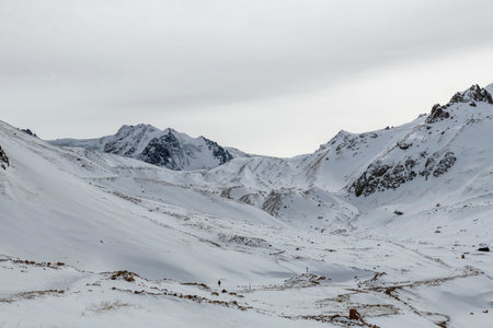 Winter mountain landscape. Peaks, rocks and glaciers. Kazakhstan nature.の写真素材