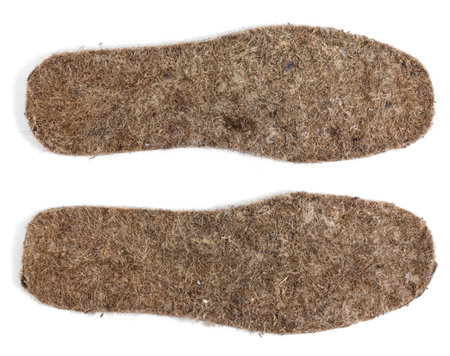 Felt insoles for shoes isolated on white background