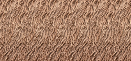 Brown camel wool close-up, textured horizontally seamless background