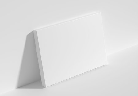 Blank white empty horizontal rectangular poster on floor leaning at empty white wall, top diagonal...