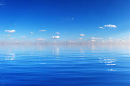 Blue tranquil minimalist landscape with water surface with waves and blue sky with small white in summer day in bright sun light, simple beautiful calm natural blue background, 3d illustrationの写真素材