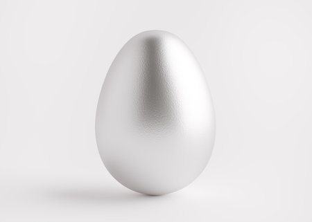 Silver egg close-up on a white background. Easter holiday. 3D rendering.の写真素材