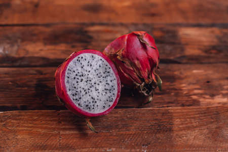 Dragon fruit on a tree backgroundの写真素材