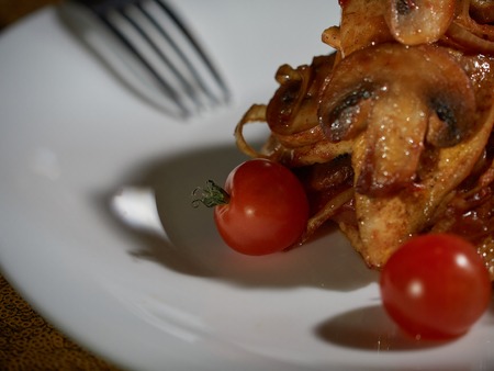 Fresh beef with fried mushrooms.の写真素材