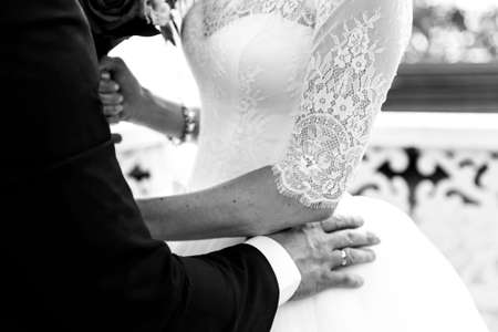 Newlyweds are hugging. Close up.の写真素材