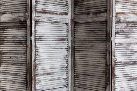 Vintage interior with white delicate decorative old wood panelの写真素材