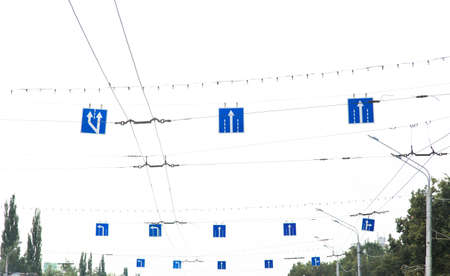 pendant blue road signs. driving in stripsの写真素材